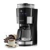 Coffee machine with grinding function